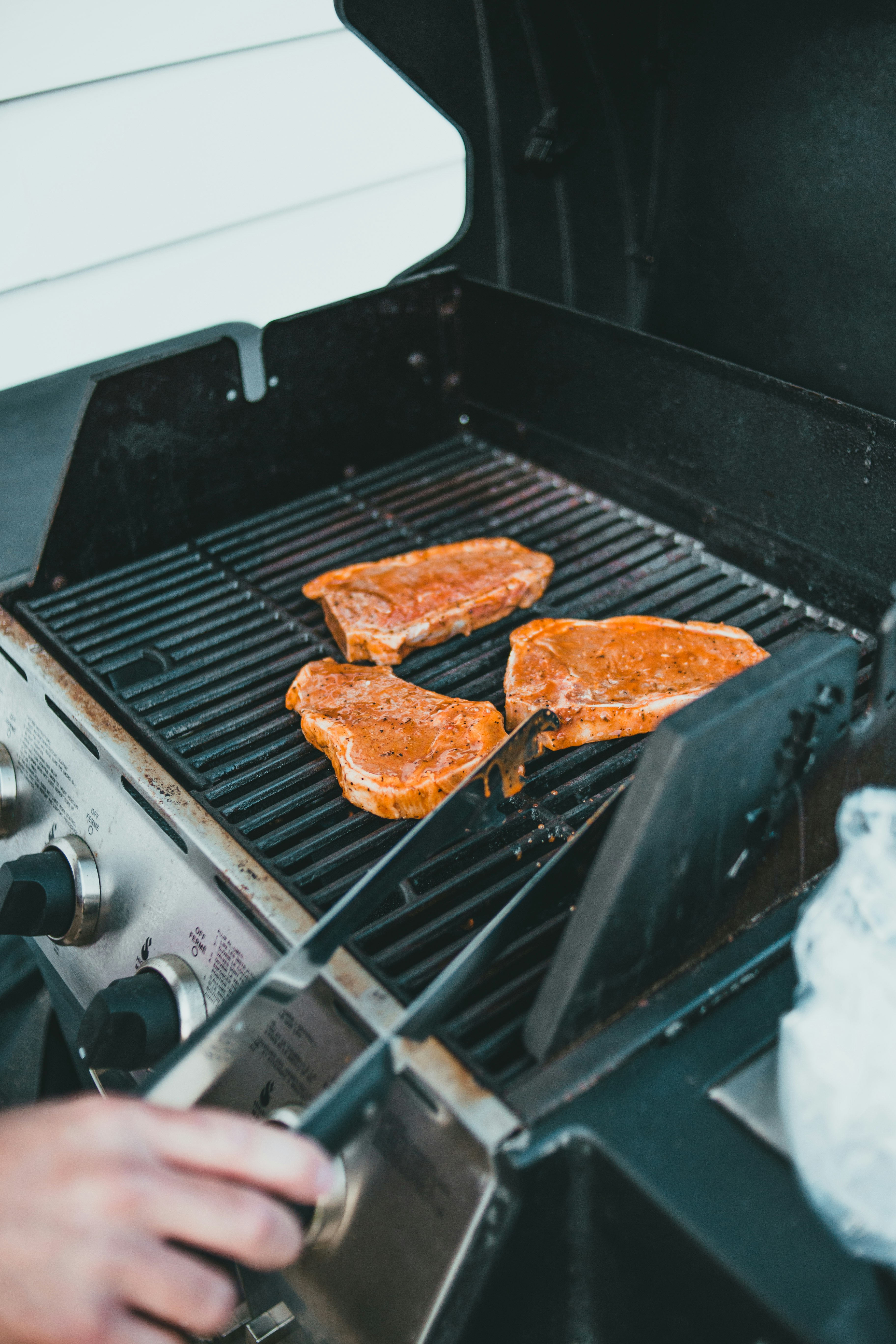 meat on black outdoor grill